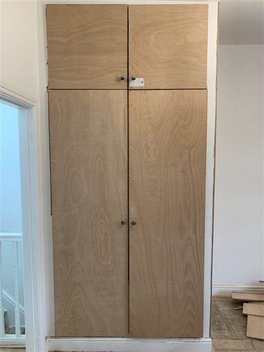 Tall made-to-measure cupboard