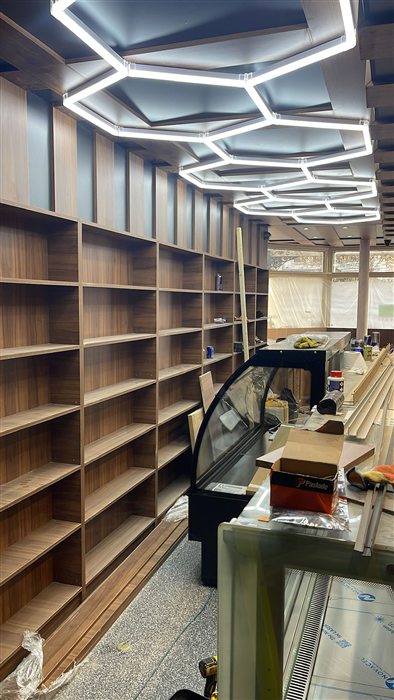Timber shelving in a shop fit-out